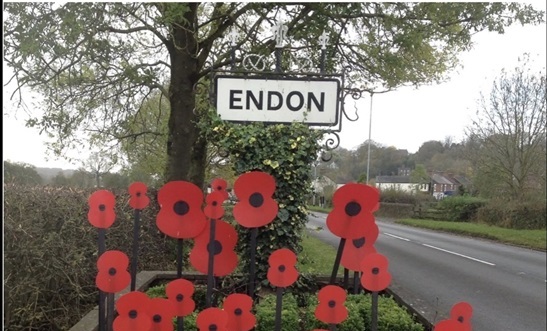 Image of the Endon roadsign and flowerbed 